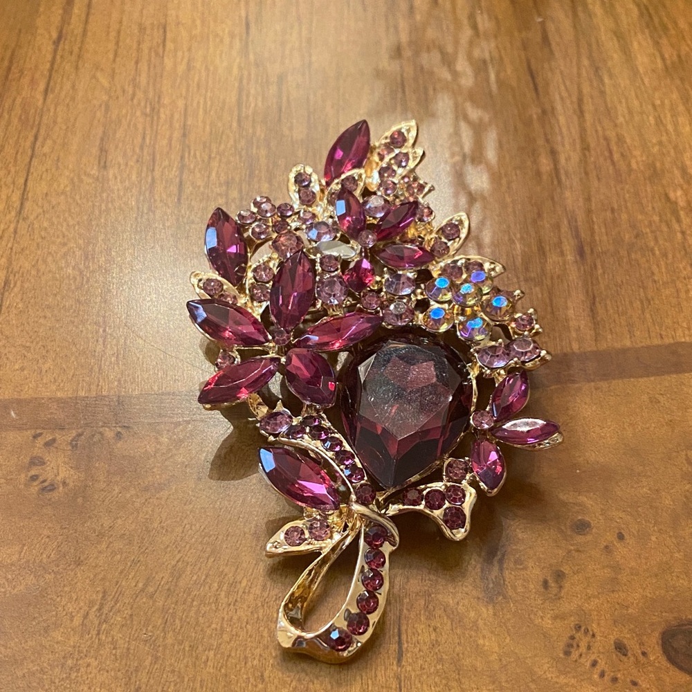 Elegant Gold and Purple Brooch